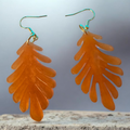 Love For Resin amber-toned translucent resin leaf dangle earrings with gold-tone hooks for a botanical autumn look.